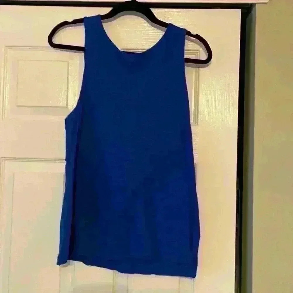 Blue tie back tank from Anthropologie. Size M.